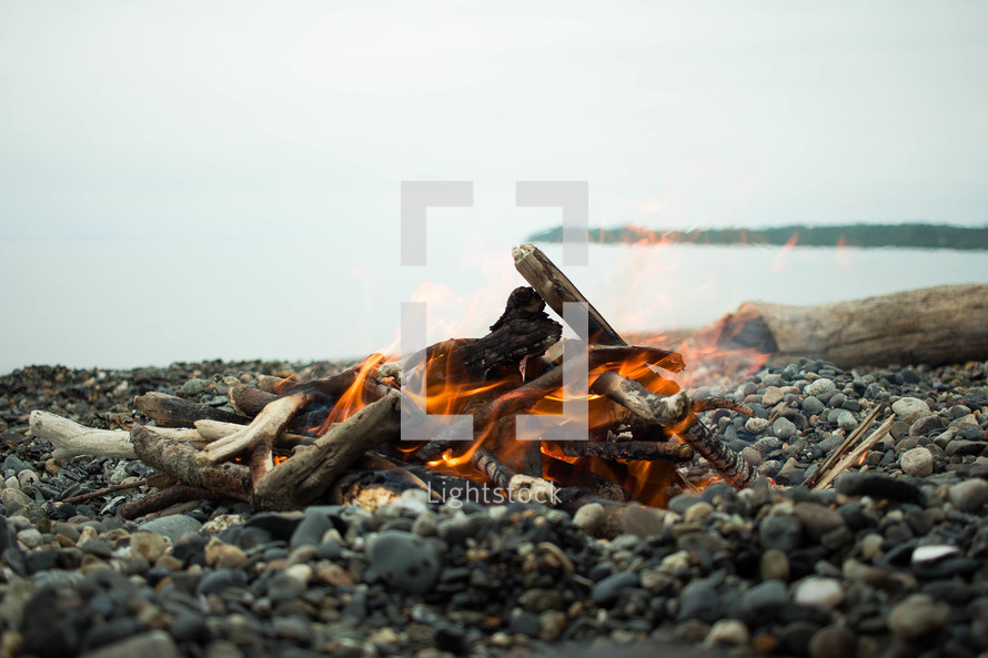 campfire on a beach 