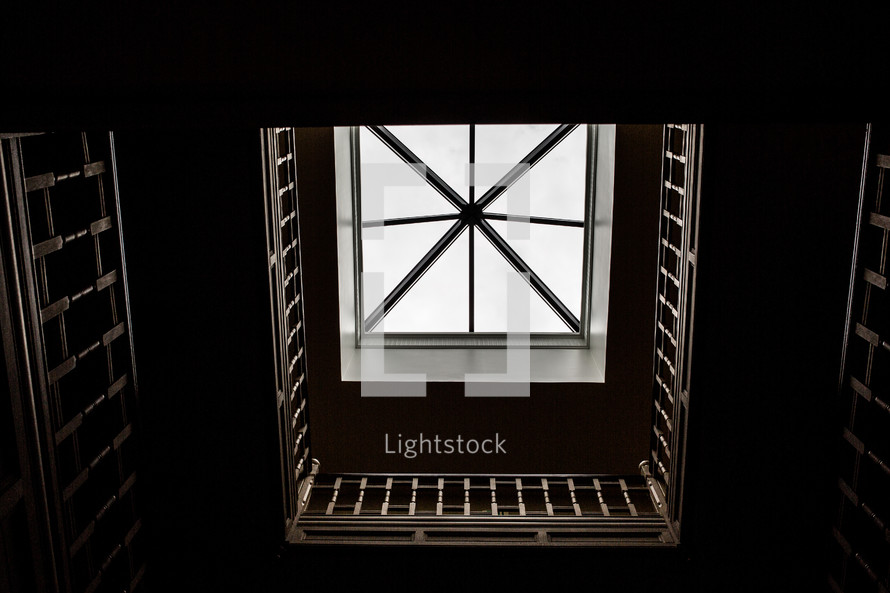 looking up through a stairwell 