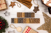 cinnamon sticks, ornaments, hot cocoa, and gift box border for Christmas 