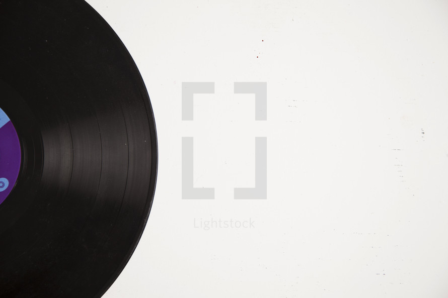 vintage record on a white table.