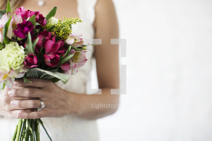 bride holding a bridal bouquet 