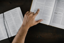 a man reading at a Bible study 