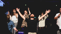 worship leaders leading a congregation in songs of praise 
