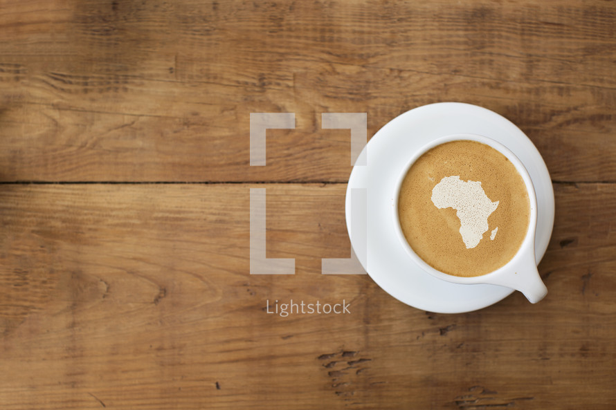 shape of Africa in froth of a latte.