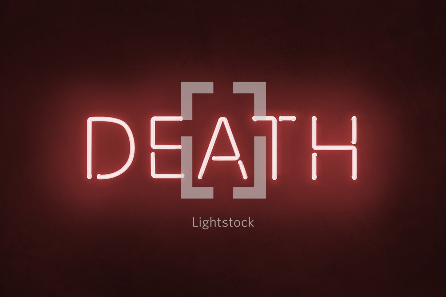Illuminated Death neon sign on dark background