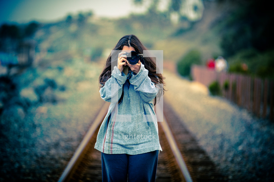 woman taking a photograph 