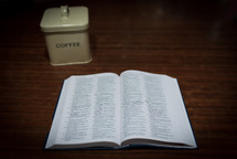 open Bible and coffee tin