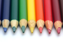 border of colored pencils in rainbow colors