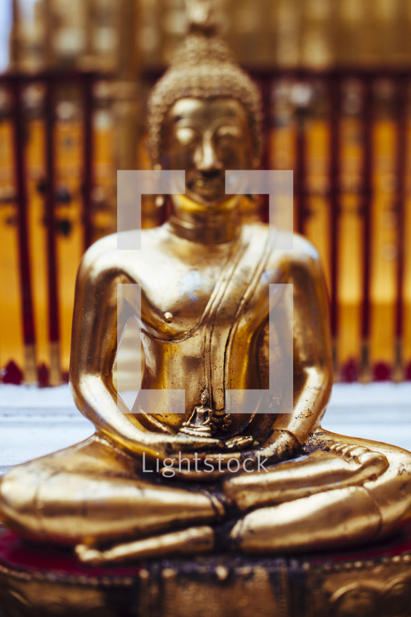 gold Hindu Buddha statue 