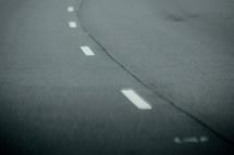 road to success - double exposure passing lane curve in a road 