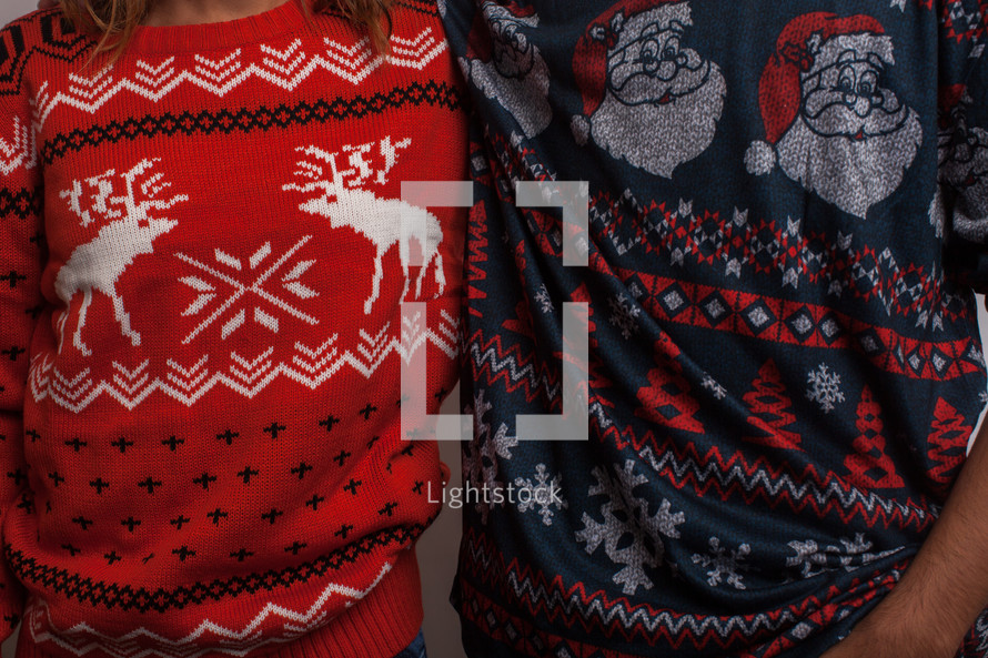 woman and man in an ugly Christmas sweater 