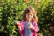 child eating a caramel apple 