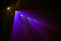 spotlights radiating on stage 