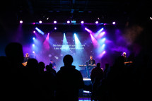 concert, projection screen, man, on stage, audience, worship service, contemporary worship service 