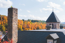church roof and fall trees 