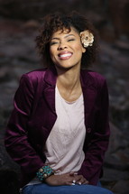 portrait of an African American woman with a flower in her hair 
