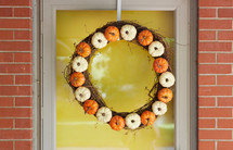 pumpkins on a fall wreath 