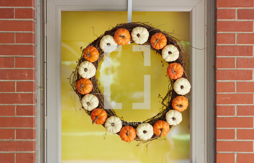 pumpkins on a fall wreath 