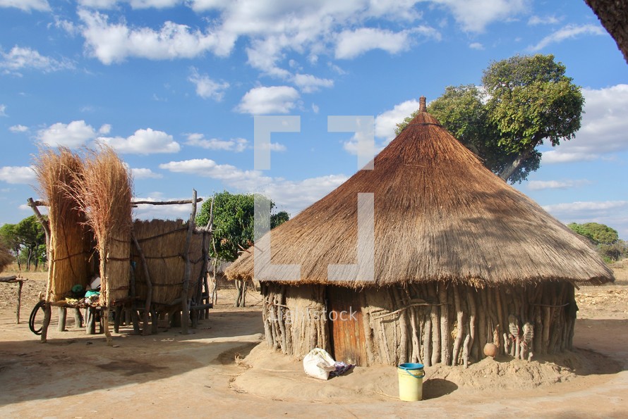 straw roof huts in a village