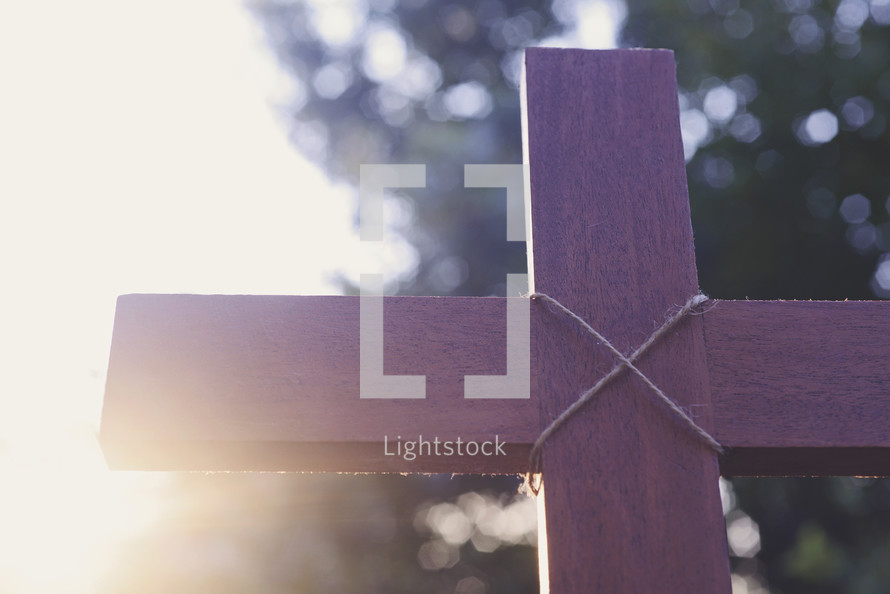 sunlight behind a cross 