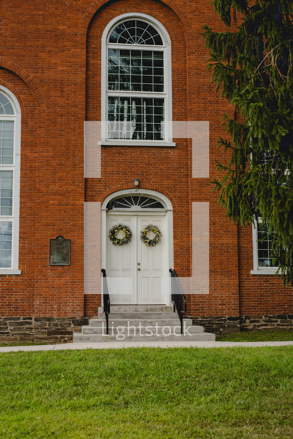 spring wreathes on church doors 