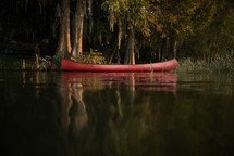 canoe floating in a bayou