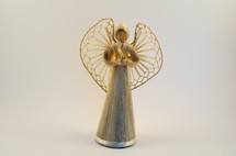 A straw angel figurine. 