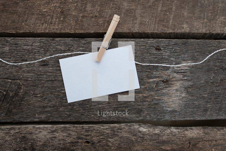blank card stock on clothespin 