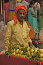 Indian man with fruit