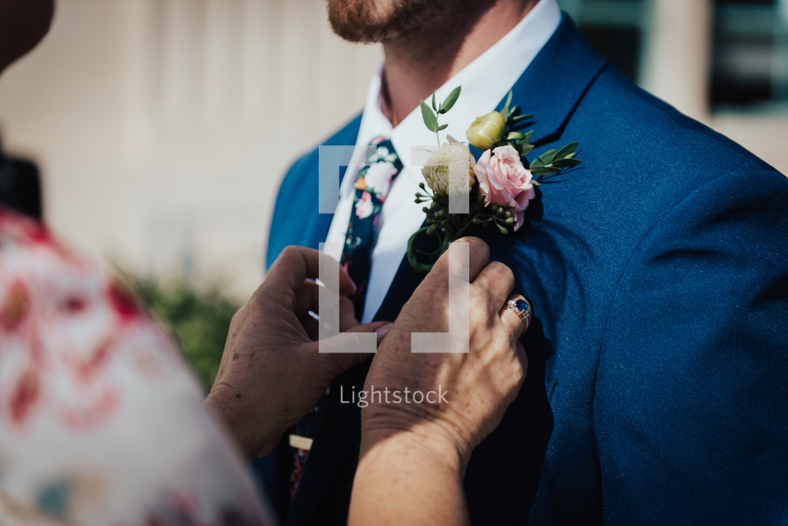 groom with a boutonniere