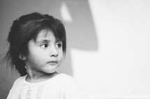 Head shot of a small girl, looking away