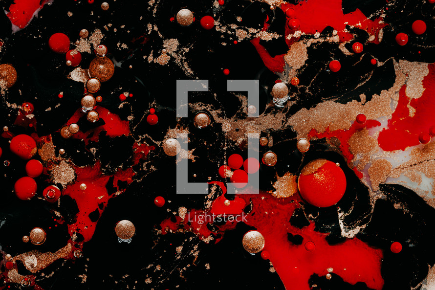 Abstract marble liquid glitter paint. Bubbles. Dark and red pearl inks in oil. Colorful shapes. Detailed background, amazing design, swirling. High quality photo
