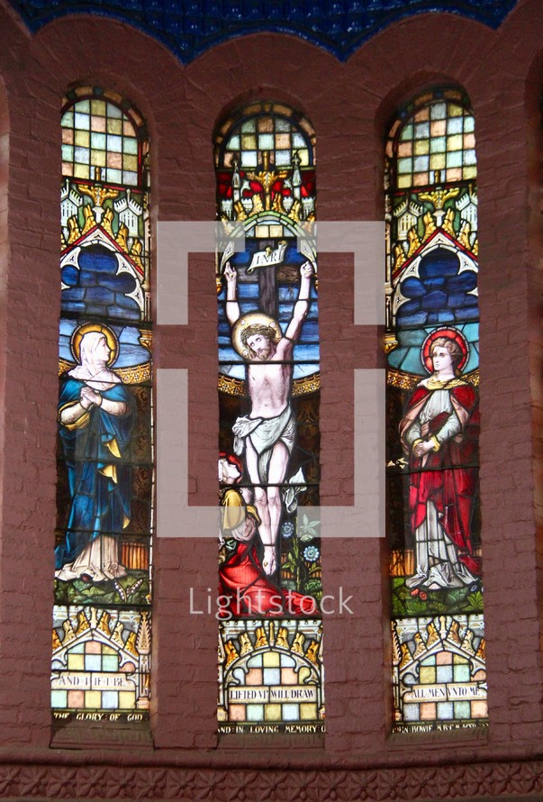 stained glass window of the crucifixion of Jesus 