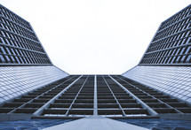 Ground view of a tall building.