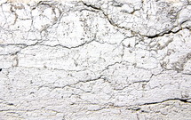 Cracked plaster on an ancient wall.
