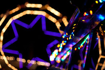lights from rides in an amusement park