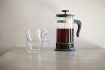 glass mugs and a coffee press 