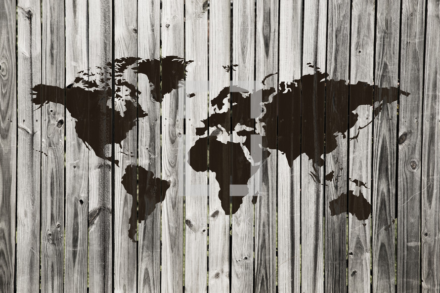 world map painted on an old wood fence.