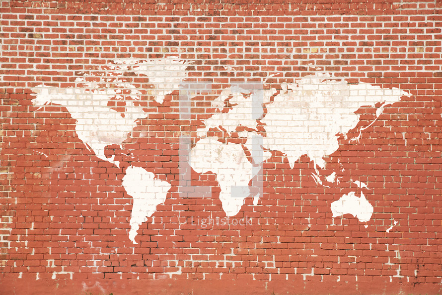 world map painted on an old brick wall.