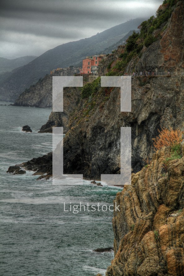 seaside village on the cliffs of a rocky shore
