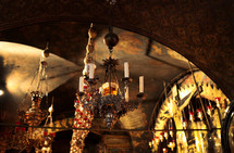 beaded chandeliers, ornate decoration within the Church of the Holy Sepulcher