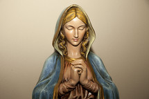 statue of a Mary praying 