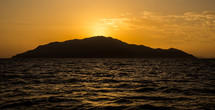 island and sea at sunset 