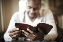 Man reading a bible