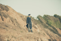 graduate on a cliff 