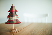 flannel plaid Christmas tree on a wood table 