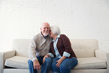 a happy, loving elderly couple 