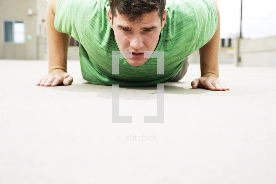 man doing pushups