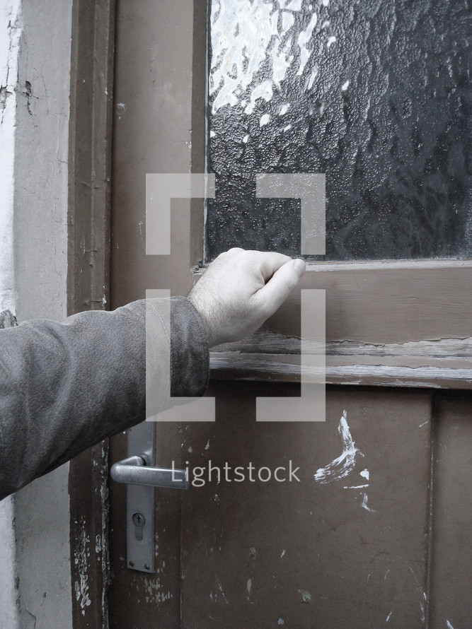 someone knocking at an old door