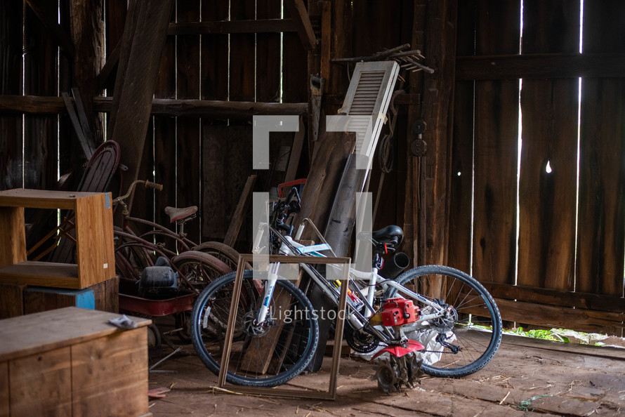bicycle and other items in a shed 